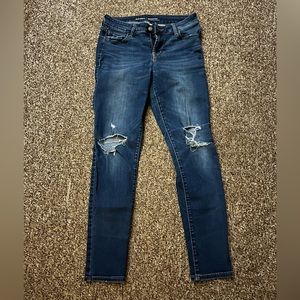 Old Navy Rockstar Dark Wash Jeans with rips.